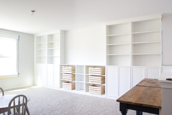 DIY IKEA Bookcase Built In Shelves with Oxberg Doors in a playroom
