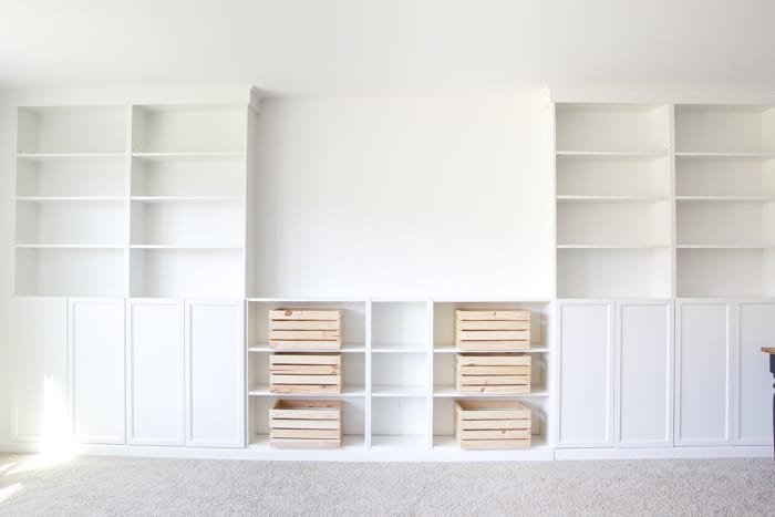 Finished DIY built-ins using IKEA bookcases and Oxberg doors