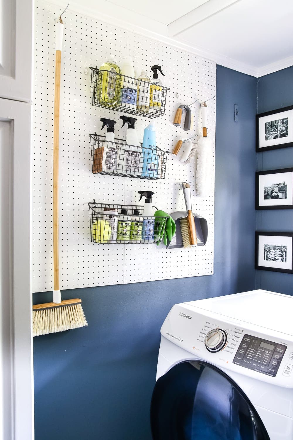 organized pegboard wall in a laundry room with cleaning supplies