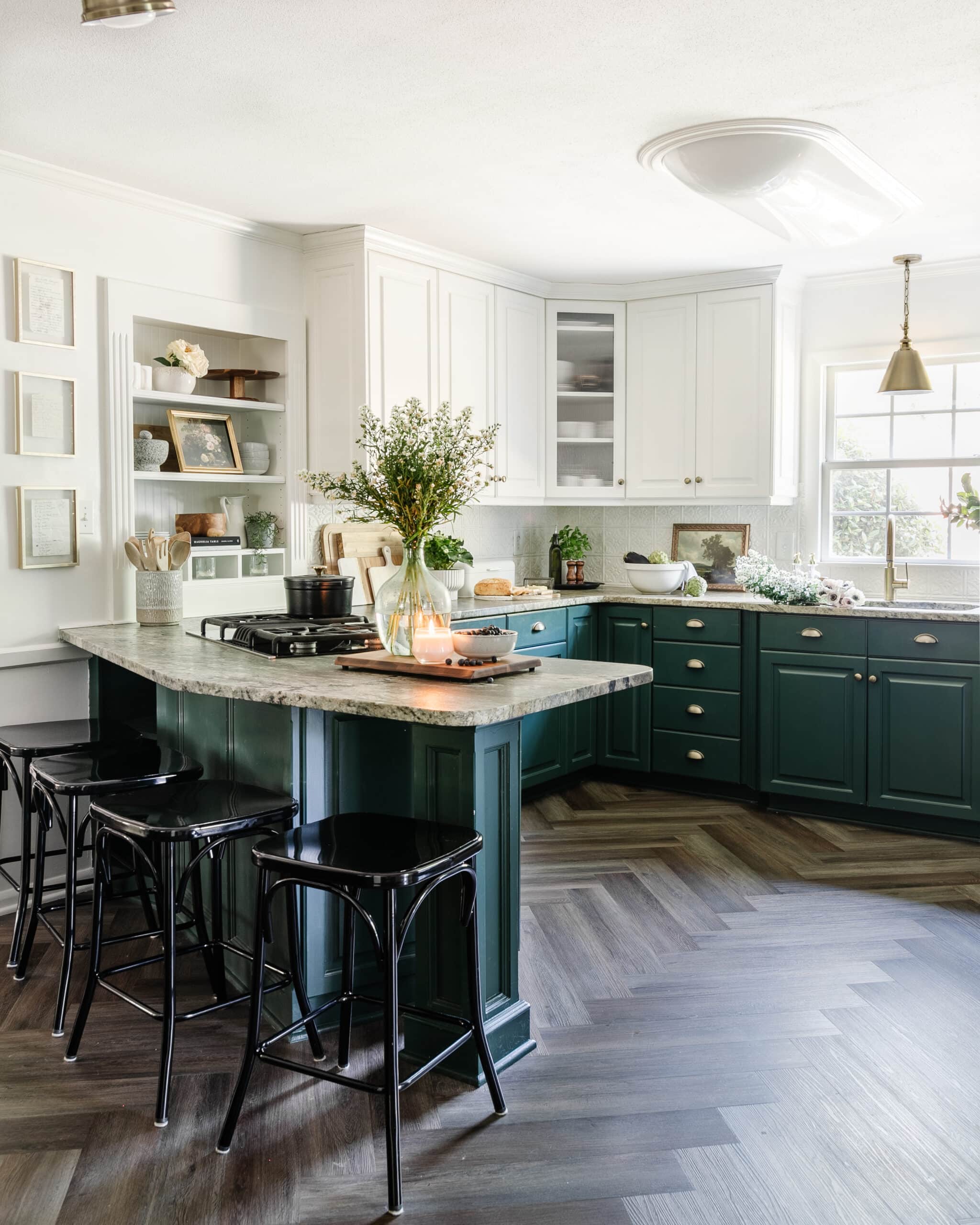 kitchen facelift with herringbone floors, green cabinets, and cottagecore style
