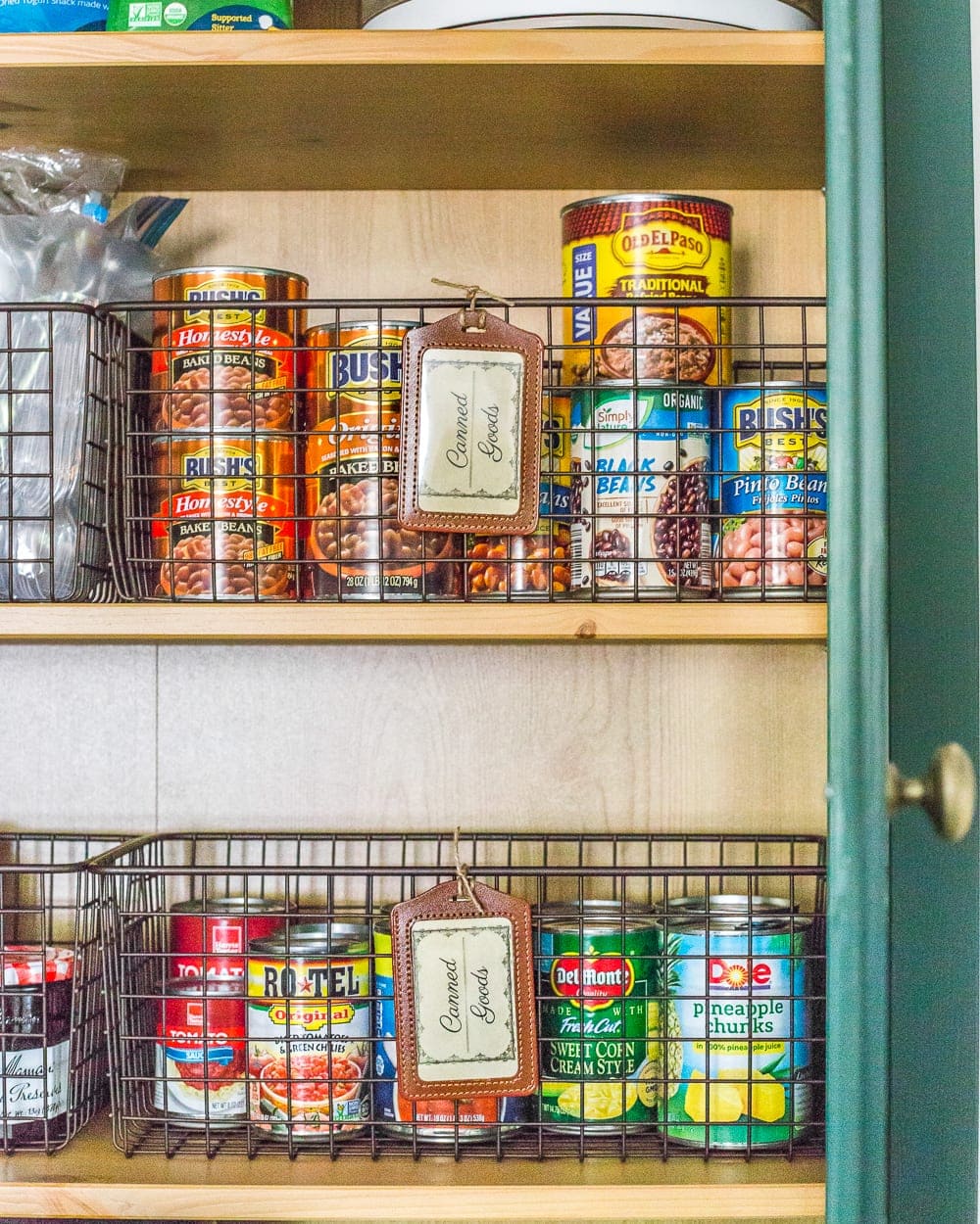 canned good pantry storage in wire baskets