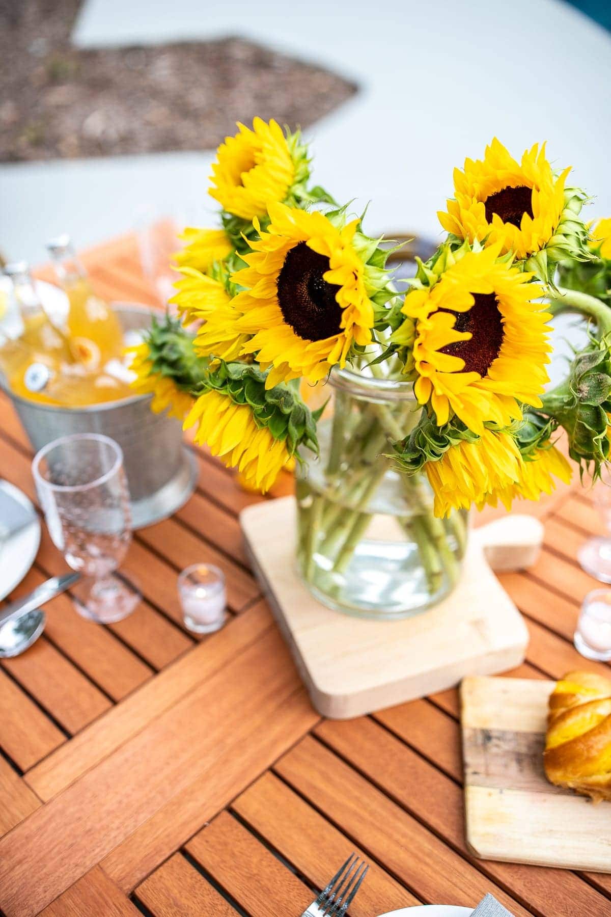 DIY fall centerpiece with simple vase of sunflowers