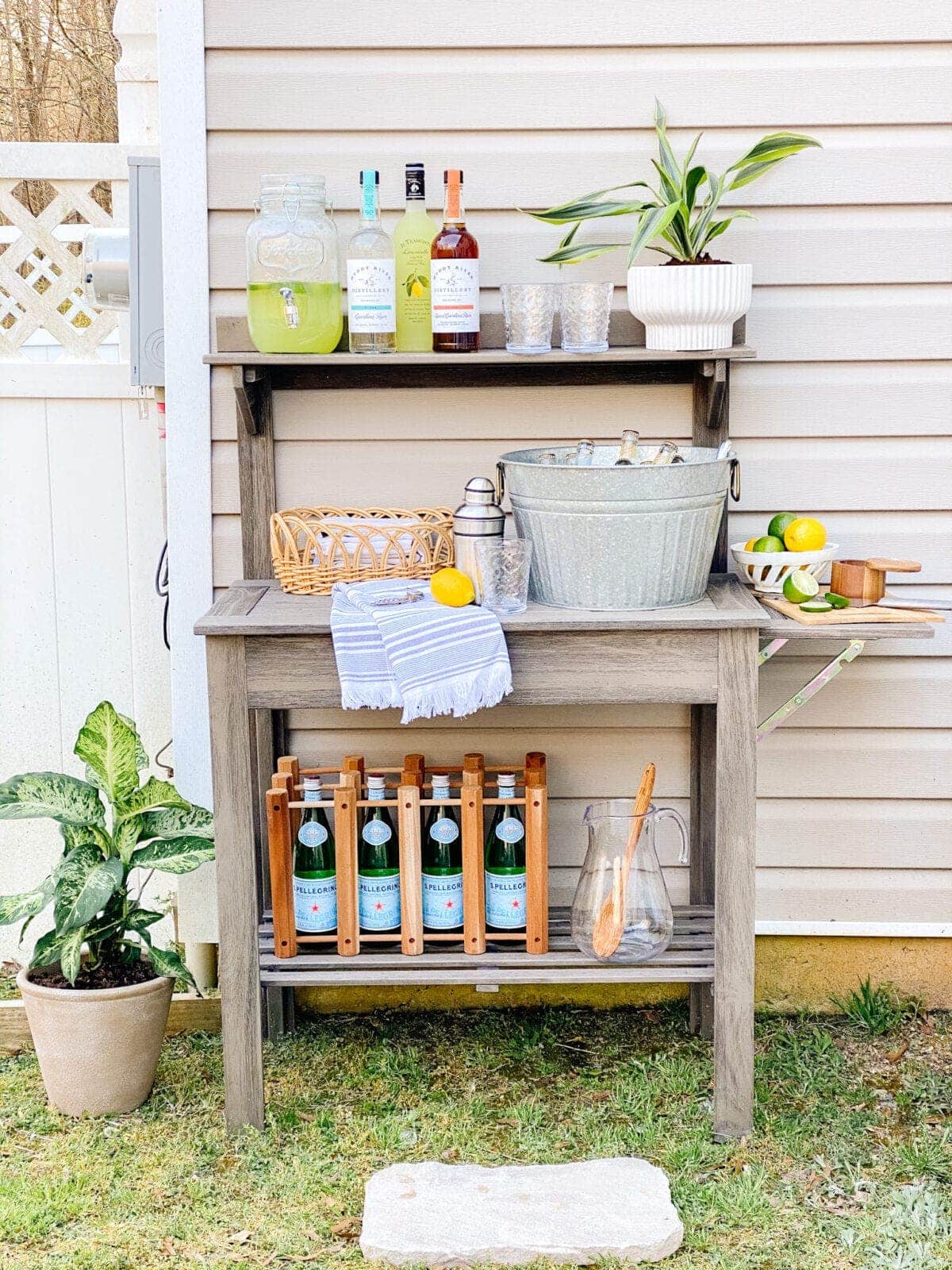 things to buy while thrift shopping : buckets and baskets pictured on outdoor bar