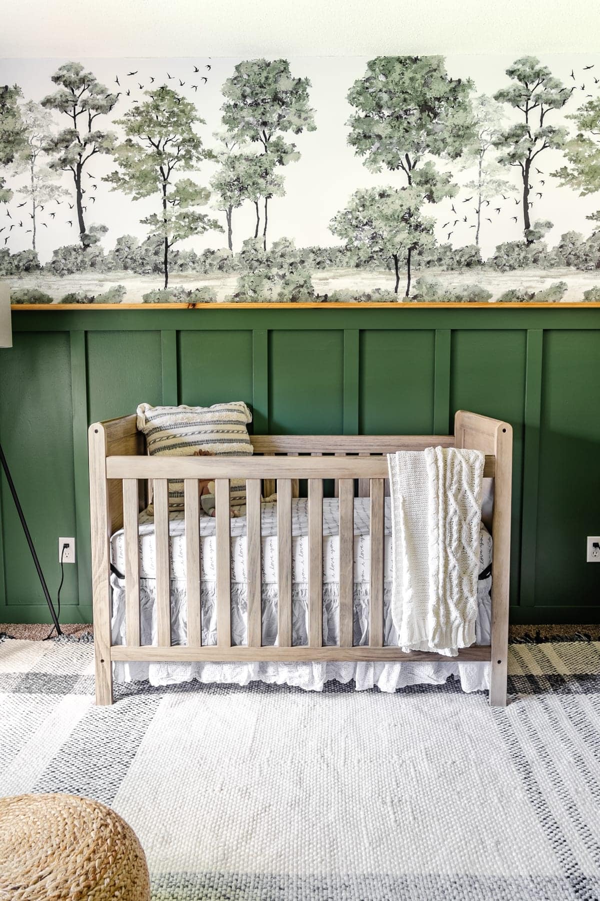 Romabio Midsummer green baby boy nursery with wallpaper mural and board and batten wall molding