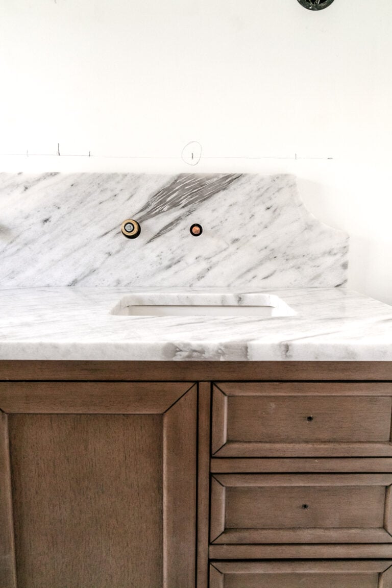 Our Scalloped Marble Backsplash in the Bathroom Reno