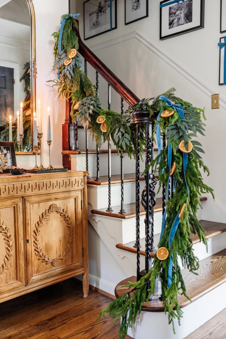 How to Hang Garland on Stairs + Entryway Christmas Decor