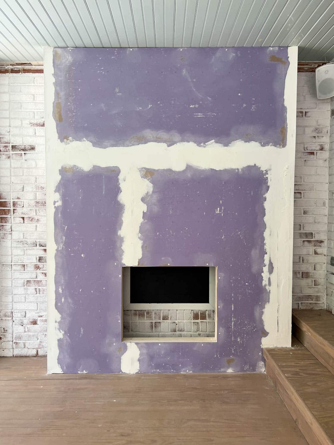 mudded drywall on a fireplace 