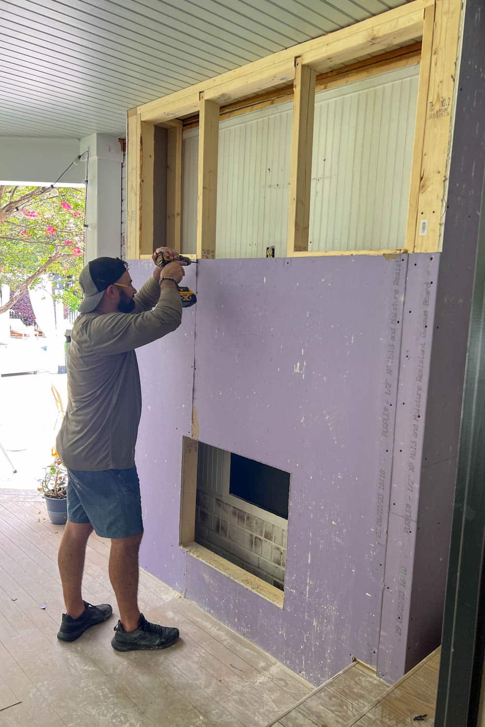 screwing moisture resistant drywall to a porch fireplace frame