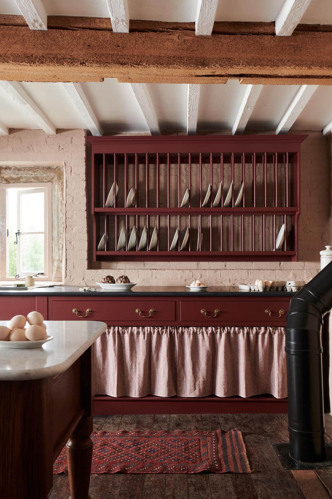 burgundy kitchen cabinets by devol kitchens