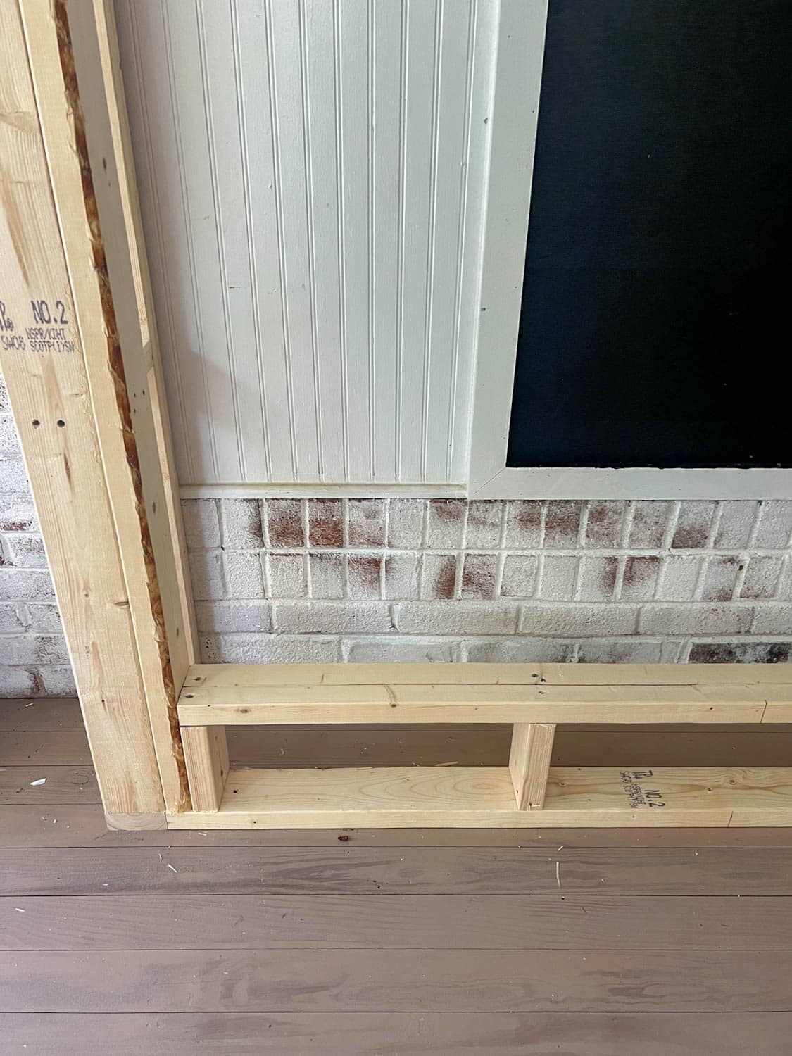 footer board of DIY fireplace frame