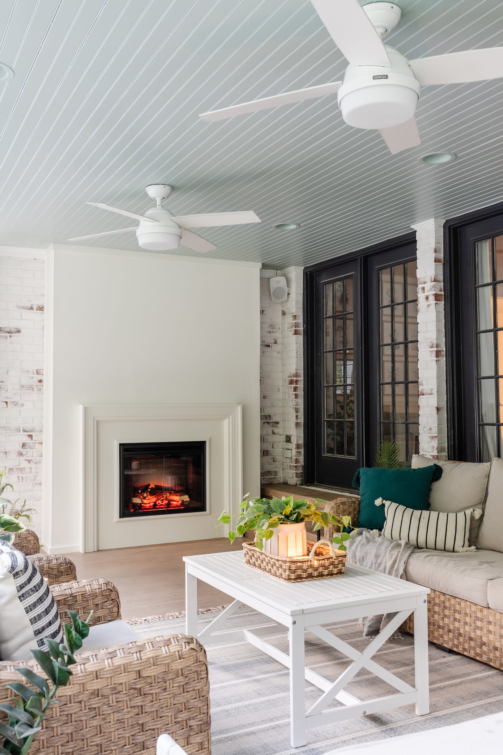 easy diy electric fireplace on a back porch with faux plaster